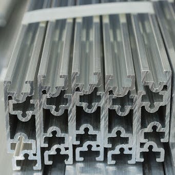 Extruded aluminum. Image Credit: Shutterstock.com/David Pimborough