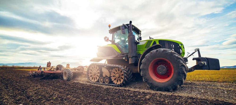 Modern tractor on a farm
