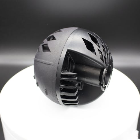 Vapor smoothing of a HP MJF part (right) with a standard finish on the other half (left).