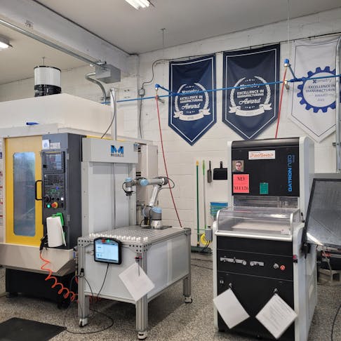 Cerven Solutions facility with Xometry awards hanging on the wall